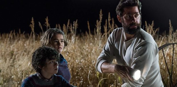 Left to right: Noah Jupe plays Marcus Abbott, Millicent Simmonds plays Regan Abbott and John Krasinski plays Lee Abbott in A QUIET PLACE, from Paramount Pictures.