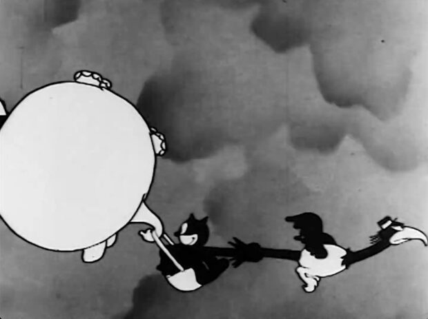 A hippo balloon carries Julius the cat aloft through storms