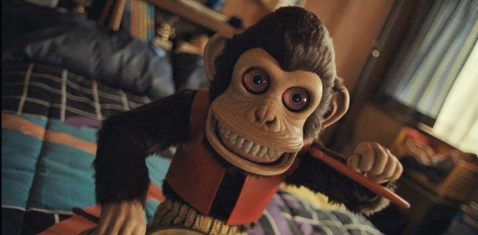 The drumming monkey from The Monkey (2025)