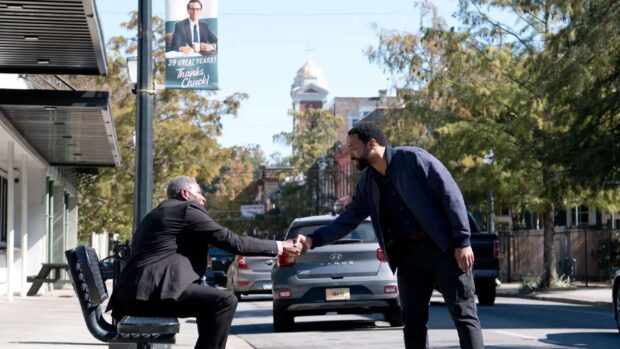Chiwetel Ejiofor and Carl Lumbly shake hands in The Life of Chuck (2025)