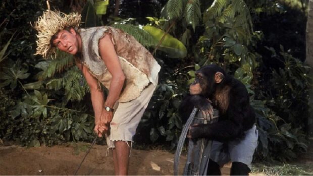 Dick Van Dyke as Lt. Robin Crusoe and Flloyd the chimp play golf on the island in Disney’s 1966 live-action comedy.
