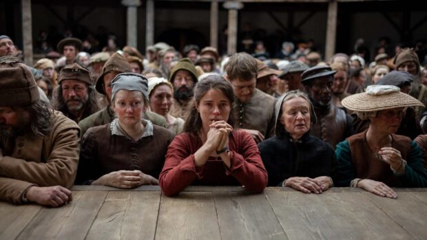 Jessie Buckley weeps near the Globe stage in Hamnet (2025)