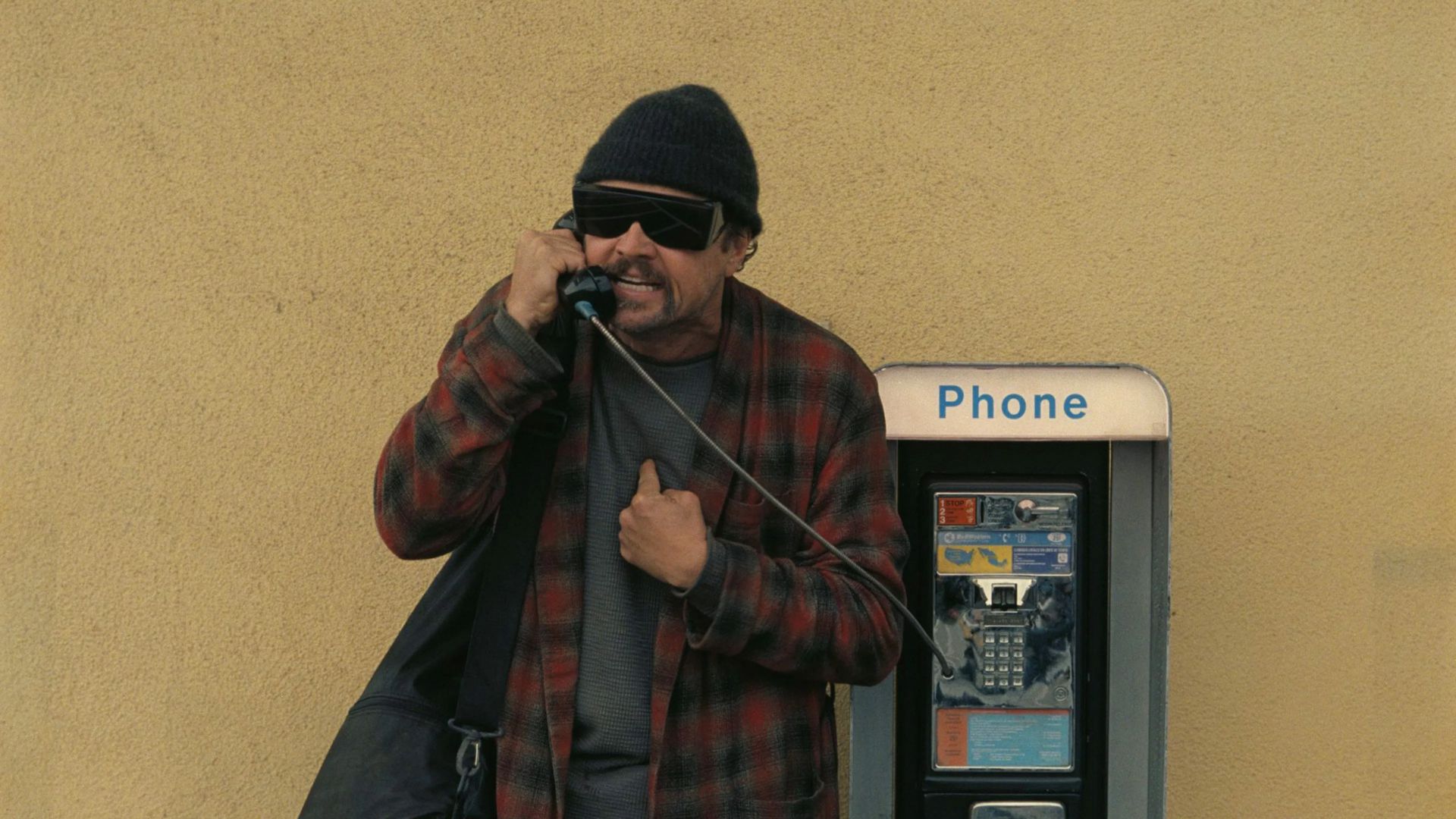 Leonardo DiCaprio on the phone in One Battle After Another.